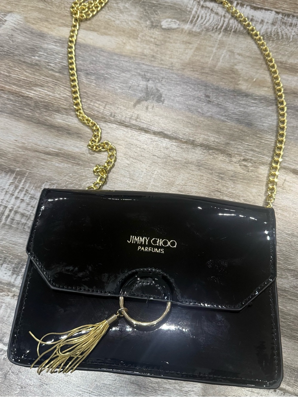 Jimmy Choo Black Patent Crossbody with Gold Chain and Tassel